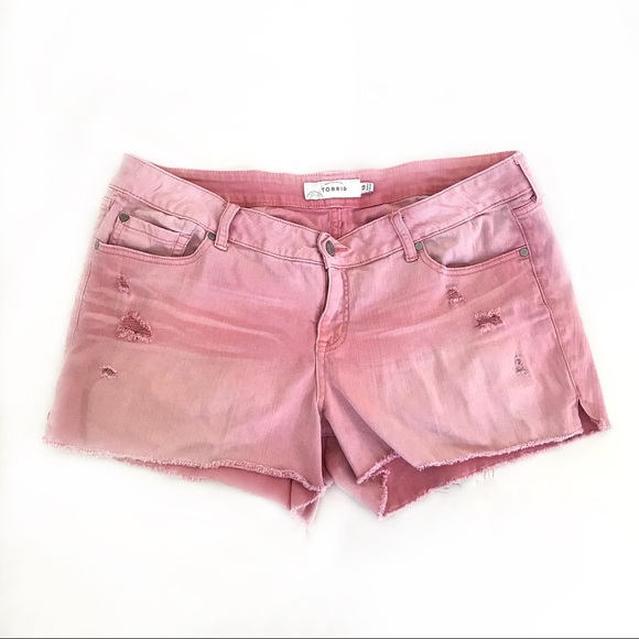 pink distressed shorts
